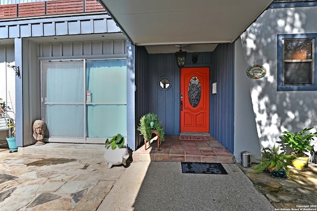 1211 Mount Riga, San Antonio, TX 78213 - doorway to property featuring board and batten siding