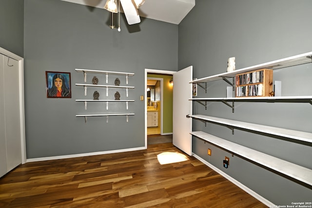 1211 Mount Riga, San Antonio, TX 78213 - unfurnished bedroom with wood finished floors, baseboards, a towering ceiling, and ceiling fan
