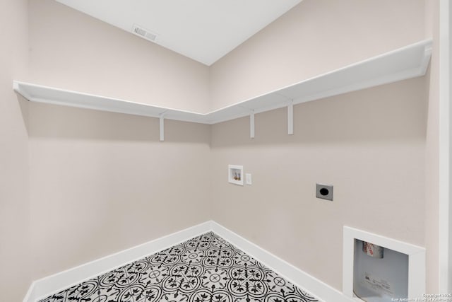 washroom with washer hookup, electric dryer hookup, and baseboards