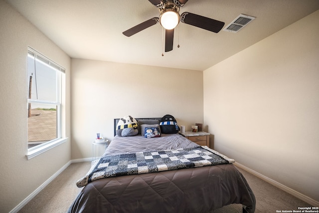 6516 Sabinal, San Antonio, TX 78252 - bedroom featuring light colored carpet, baseboards, and a ceiling fan