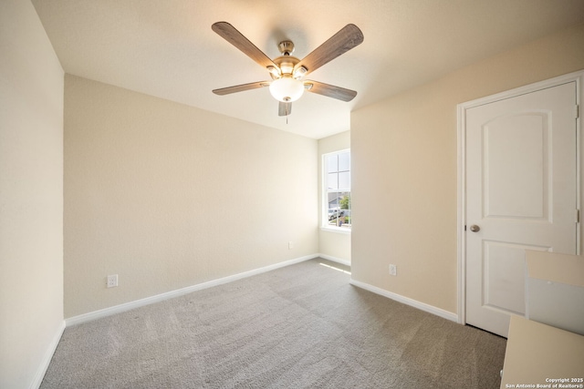 6516 Sabinal, San Antonio, TX 78252 - carpeted empty room with a ceiling fan and baseboards