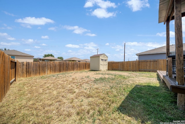 6516 Sabinal, San Antonio, TX 78252 - view of yard with a storage unit and an outbuilding