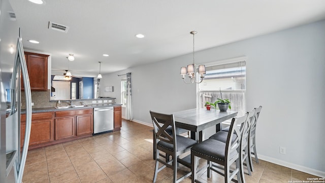 760 Guna, New Braunfels, TX 78130 - dining space featuring recessed lighting, baseboards, a chandelier, light tile patterned flooring, and ceiling fan