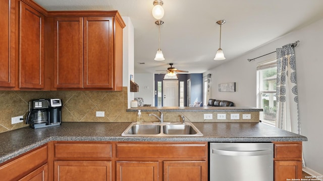 760 Guna, New Braunfels, TX 78130 - kitchen with dishwasher, a sink, dark countertops, and backsplash