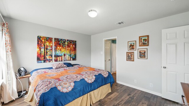 760 Guna, New Braunfels, TX 78130 - bedroom featuring dark wood-style flooring and baseboards