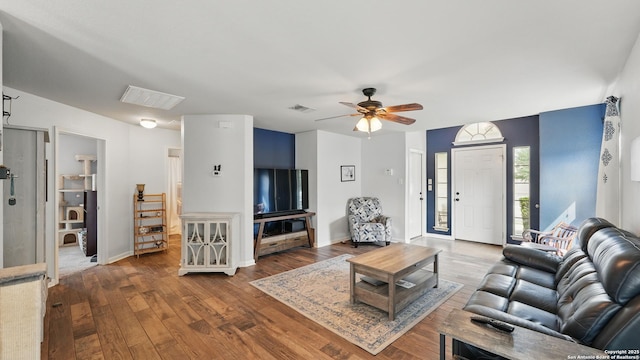 760 Guna, New Braunfels, TX 78130 - living room with wood finished floors, a ceiling fan, and baseboards