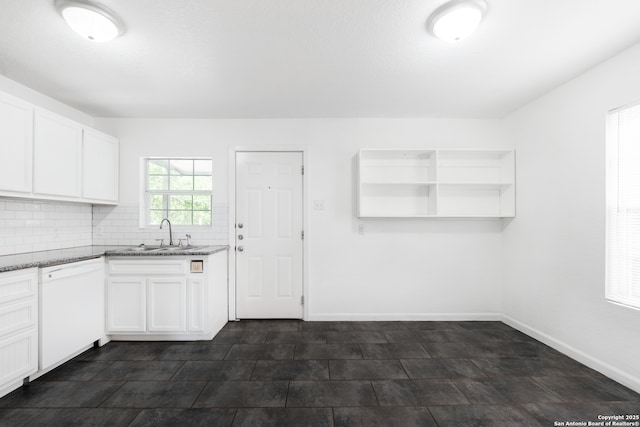 114 Oxford, San Antonio, TX 78213 - kitchen featuring dishwasher, a sink, light stone countertops, and white cabinetry
