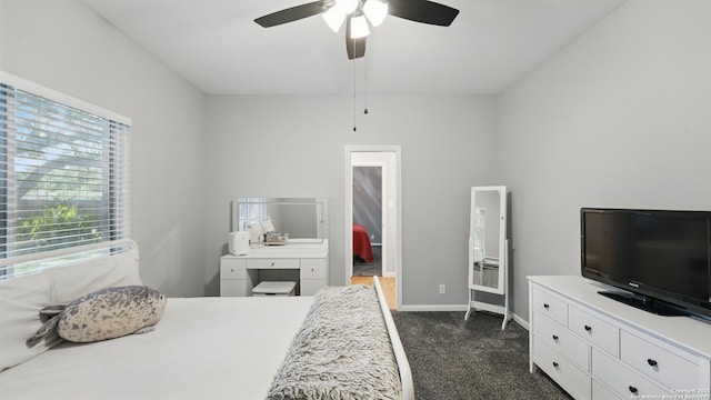 14534 Gunter Ave, San Antonio, TX 78254 - bedroom featuring dark colored carpet, baseboards, and ceiling fan