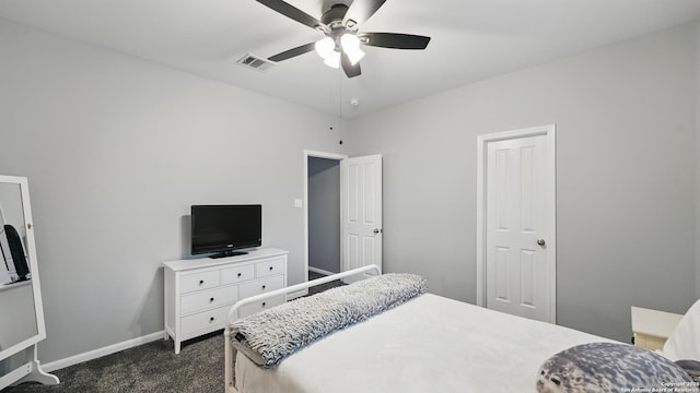 14534 Gunter Ave, San Antonio, TX 78254 - bedroom featuring dark carpet, baseboards, and ceiling fan