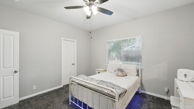 14534 Gunter Ave, San Antonio, TX 78254 - bedroom with dark carpet, baseboards, and a ceiling fan
