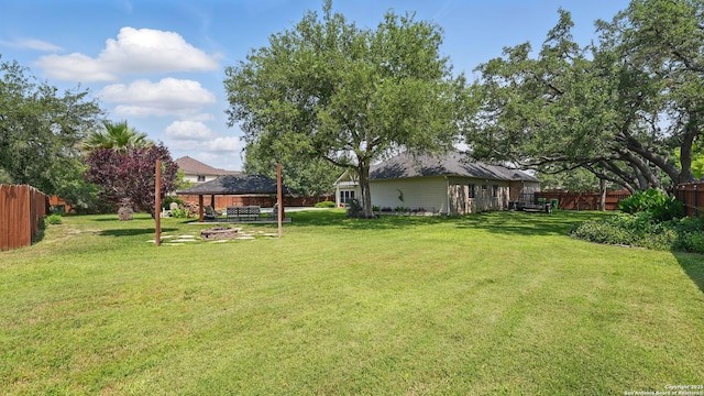 14534 Gunter Ave, San Antonio, TX 78254 - view of yard with a fire pit