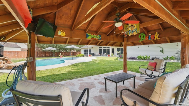 14534 Gunter Ave, San Antonio, TX 78254 - view of patio featuring a gazebo, a ceiling fan, and outdoor lounge area