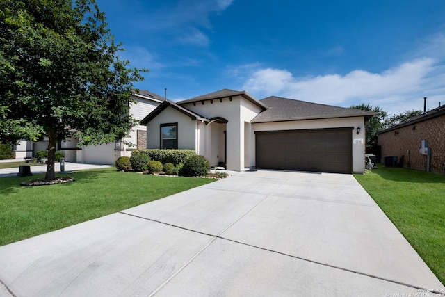12530 Big Valley Crk, San Antonio, TX 78254 - single story home featuring a garage, stucco siding, driveway, cooling unit, and a front lawn