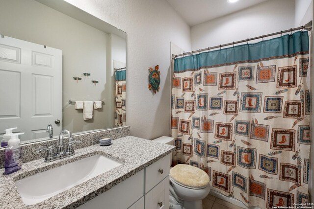 12530 Big Valley Crk, San Antonio, TX 78254 - full bathroom featuring toilet, vanity, curtained shower, and tile patterned flooring