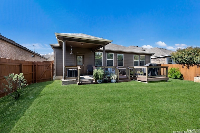 12530 Big Valley Crk, San Antonio, TX 78254 - rear view of house with a wooden deck and central AC unit