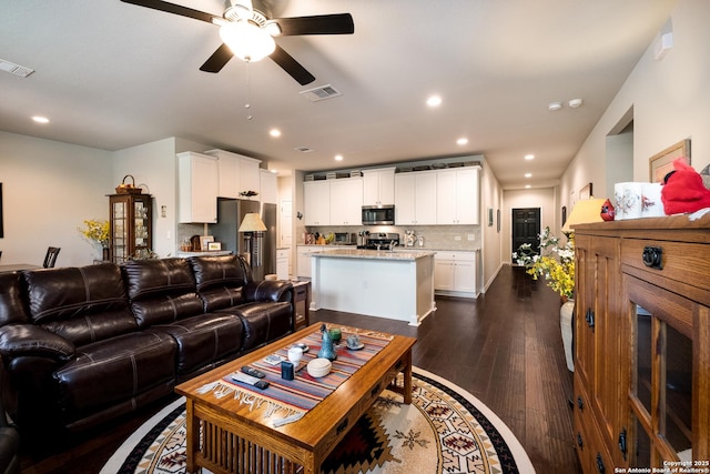 12530 Big Valley Crk, San Antonio, TX 78254 - living room featuring dark wood finished floors, a ceiling fan, and recessed lighting