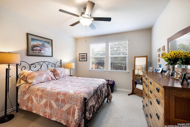 12530 Big Valley Crk, San Antonio, TX 78254 - carpeted bedroom featuring multiple windows, baseboards, and ceiling fan