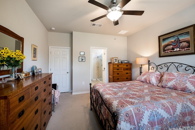 12530 Big Valley Crk, San Antonio, TX 78254 - bedroom featuring light carpet, baseboards, ceiling fan, and ensuite bath