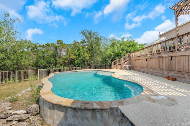 3619 Running Spgs, San Antonio, TX 78261 - view of swimming pool with a patio area, a fenced backyard, stairway, and view of wooded area
