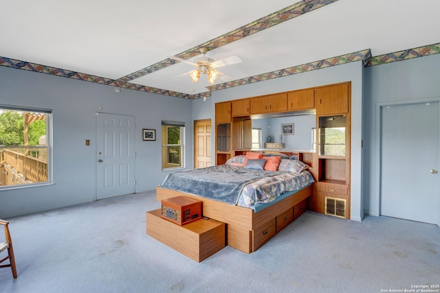 3619 Running Spgs, San Antonio, TX 78261 - bedroom with light colored carpet and a ceiling fan