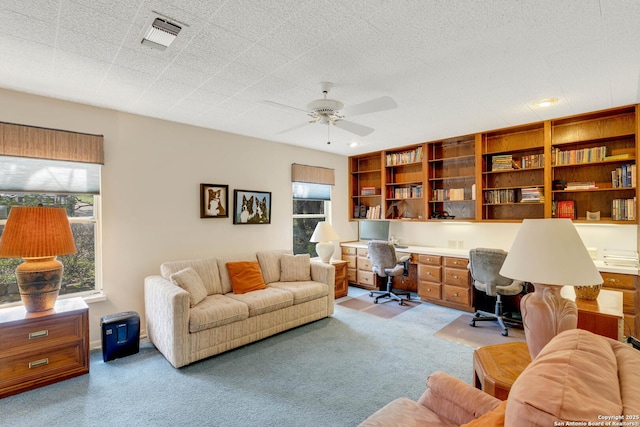 3619 Running Spgs, San Antonio, TX 78261 - carpeted home office with built in desk and a ceiling fan
