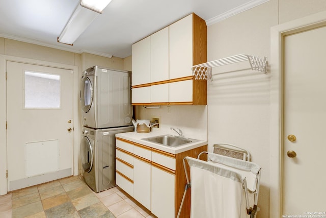 3619 Running Spgs, San Antonio, TX 78261 - laundry area featuring cabinet space, stacked washer and clothes dryer, and crown molding