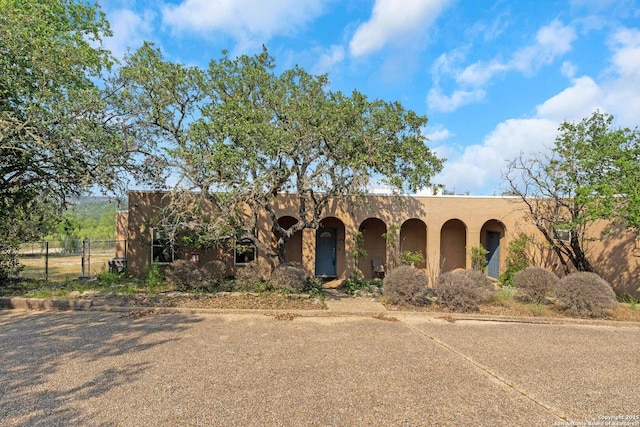 3619 Running Spgs, San Antonio, TX 78261 - adobe home with stucco siding