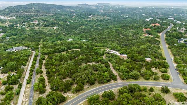 3619 Running Spgs, San Antonio, TX 78261 - aerial view of property and surrounding area featuring mountains and a forest