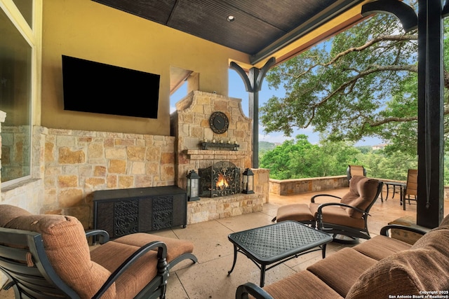 44 Oakland, Boerne, TX 78006 - view of patio / terrace featuring an outdoor living space with a fireplace