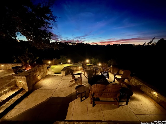44 Oakland, Boerne, TX 78006 - patio terrace at dusk with a patio