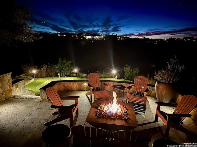 44 Oakland, Boerne, TX 78006 - patio at twilight with an outdoor fire pit and a patio