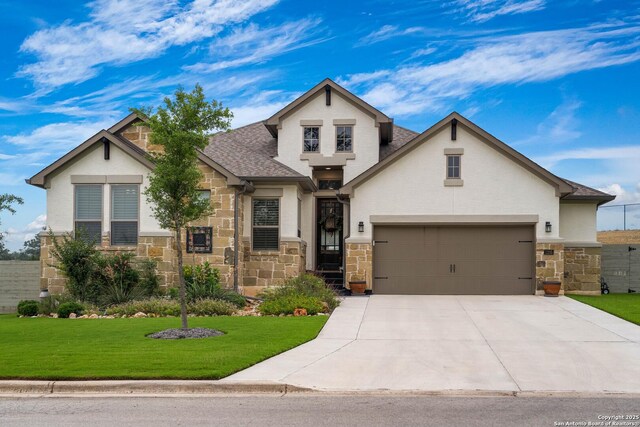 1235 Yaupon, New Braunfels, TX 78132 - view of front of house featuring stone siding, a front yard, driveway, roof with shingles, and stucco siding