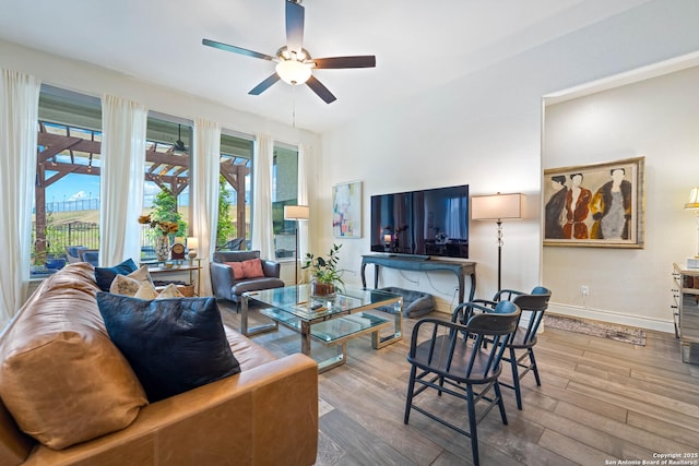 1235 Yaupon, New Braunfels, TX 78132 - living area with ceiling fan, wood finished floors, and baseboards