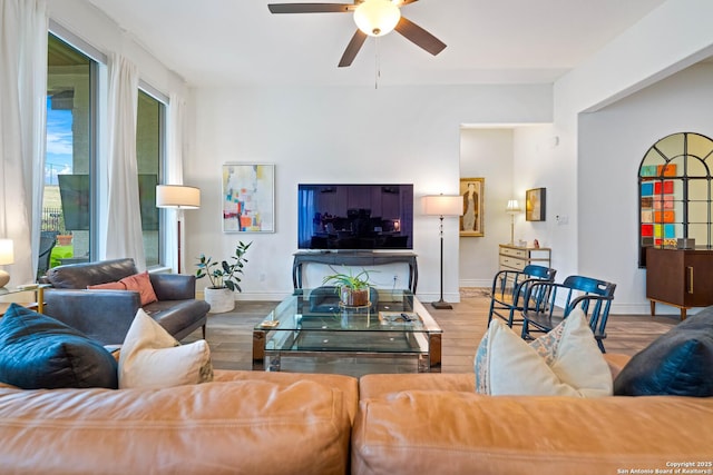 1235 Yaupon, New Braunfels, TX 78132 - living area with ceiling fan, wood finished floors, and baseboards
