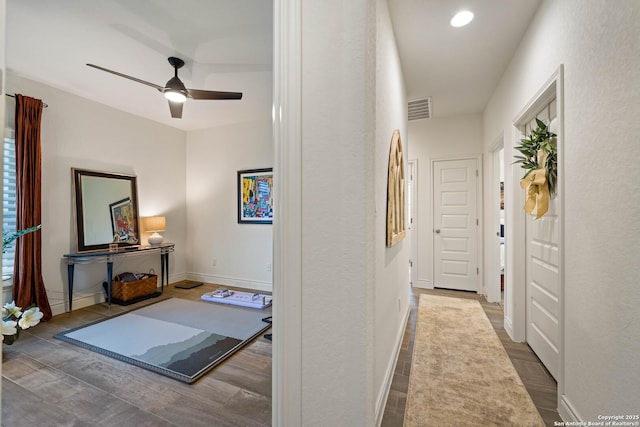 1235 Yaupon, New Braunfels, TX 78132 - corridor featuring baseboards, wood finished floors, and recessed lighting