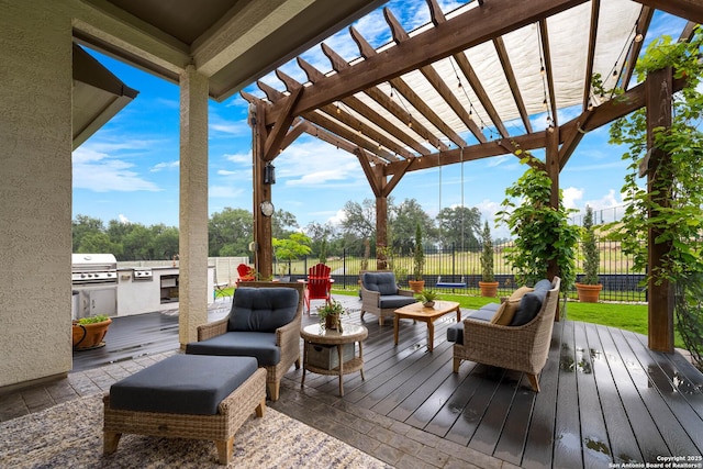 1235 Yaupon, New Braunfels, TX 78132 - wooden deck with a pergola, a grill, fence, an outdoor hangout area, and an outdoor kitchen