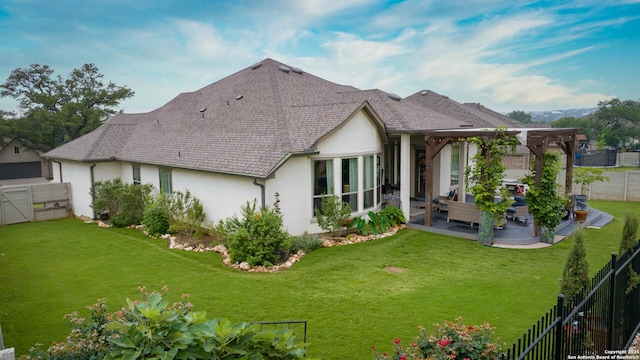 1235 Yaupon, New Braunfels, TX 78132 - rear view of house with stucco siding, a pergola, and a patio