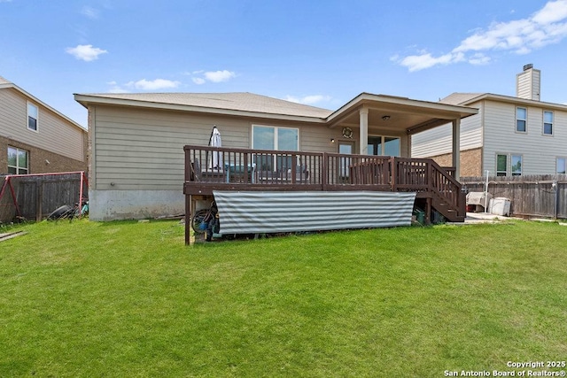 2317 Broken Wheel Ln, New Braunfels, TX 78130 - back of property featuring stairway and a wooden deck