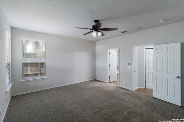 175 Katherine Way, San Antonio, TX 78253 - unfurnished bedroom with carpet floors, baseboards, a textured ceiling, and ceiling fan