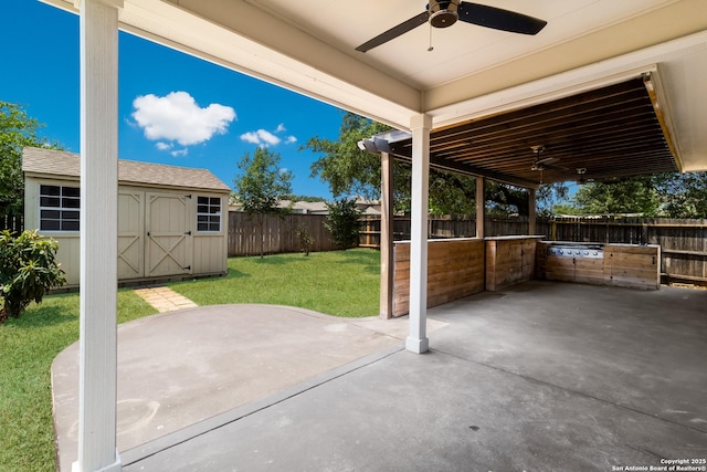 175 Katherine Way, San Antonio, TX 78253 - view of patio with a ceiling fan, area for grilling, a storage unit, and an outdoor structure