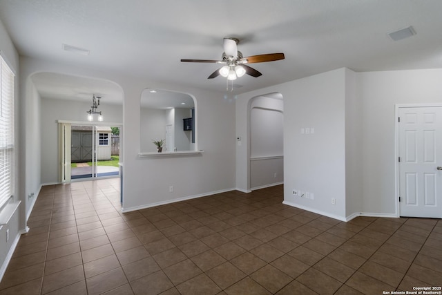 175 Katherine Way, San Antonio, TX 78253 - spare room with healthy amount of natural light, ceiling fan, dark tile patterned floors, and baseboards
