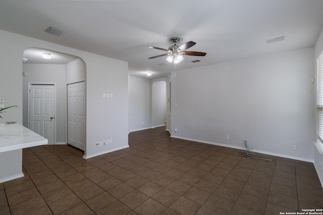 175 Katherine Way, San Antonio, TX 78253 - unfurnished room with arched walkways, ceiling fan, and baseboards