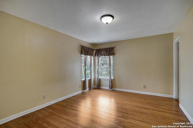 338 Tango Dr, San Antonio, TX 78216 - empty room featuring wood finished floors and baseboards