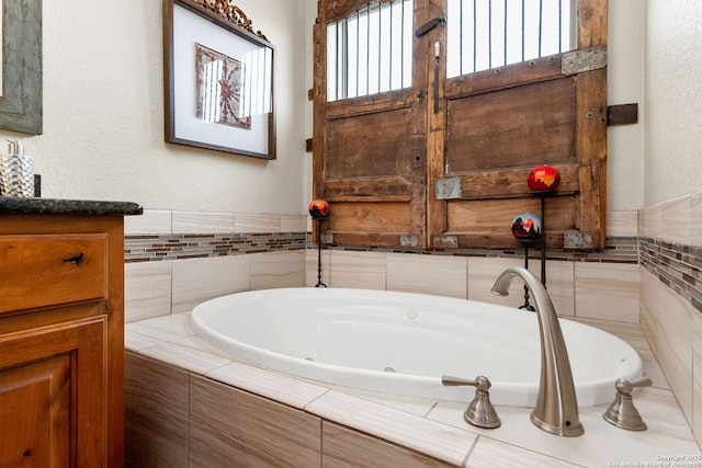 381 Schneider Rd, Seguin, TX 78155 - bathroom with a tub with jets