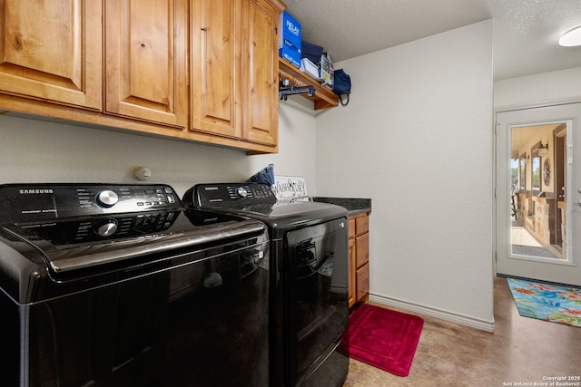 381 Schneider Rd, Seguin, TX 78155 - washroom with washer and clothes dryer, cabinet space, and baseboards