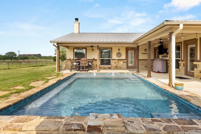 381 Schneider Rd, Seguin, TX 78155 - outdoor pool with a ceiling fan, a patio, and outdoor dining space