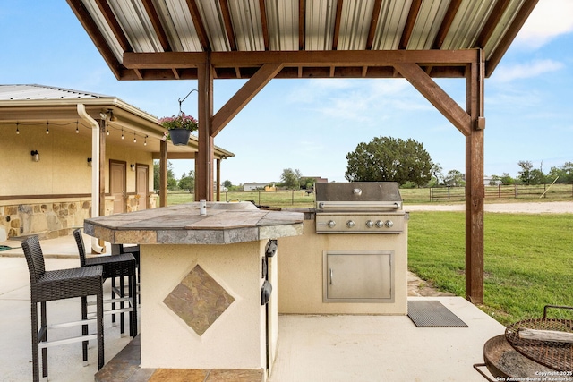 381 Schneider Rd, Seguin, TX 78155 - view of patio / terrace with area for grilling and an outdoor kitchen