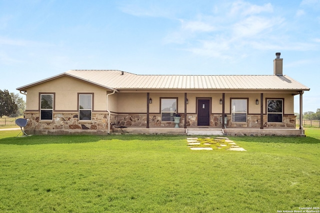 381 Schneider Rd, Seguin, TX 78155 - view of front of house featuring stone siding, stucco siding, a front yard, and covered porch