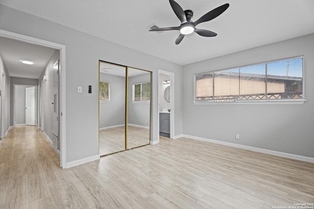 7626 Westfield, San Antonio, TX 78227 - unfurnished bedroom featuring light wood-type flooring, baseboards, a closet, ceiling fan, and ensuite bath