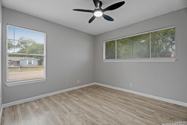 7626 Westfield, San Antonio, TX 78227 - unfurnished room featuring light wood-type flooring, ceiling fan, and baseboards